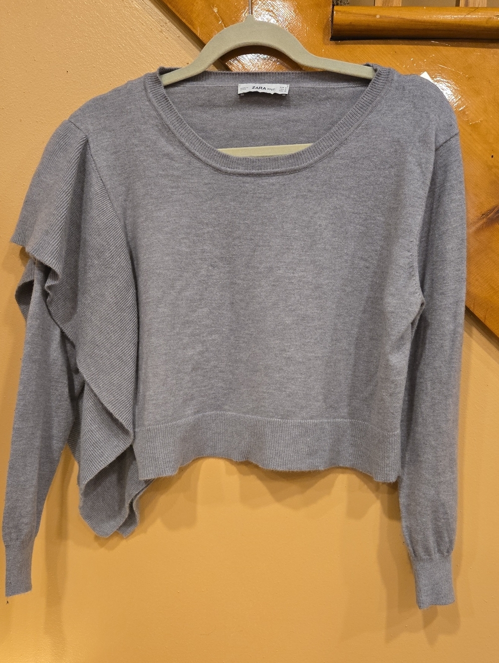 Zara Asymetrical Light Gray Ruffle-Accent Crewneck Sweater